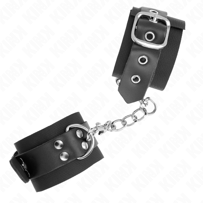 KINK - NYLON HANDFESSELN SCHWARZ MIT LEDERGÜRTEL SCHWARZ VERSTELLBAR 19-29 CM X 5,1 CM