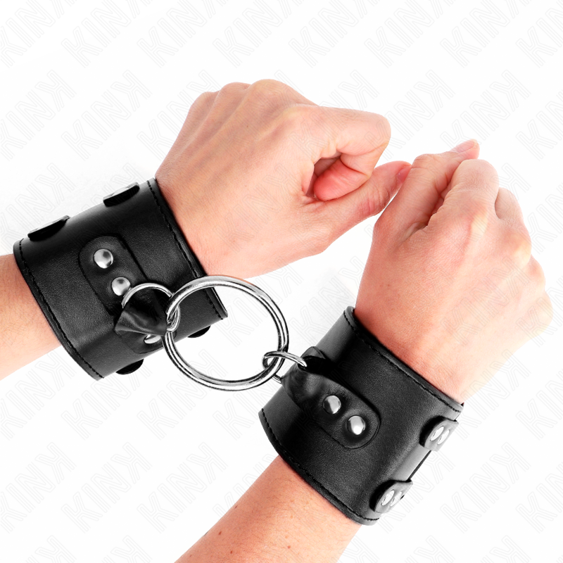 KINK - FIXE HANDGELENKFESSELN MIT RING UND NIETEN VERSTELLBAR SCHWARZ 17-22 CM X 6,5 CM